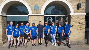 Staff from Keith Ian Estate Agents stood outside their Ware office