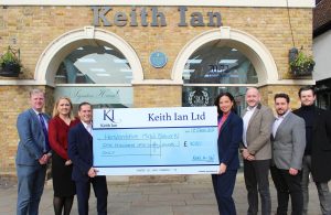 Keith Ian Estate Agents presenting our CEO with a fundraising cheque.