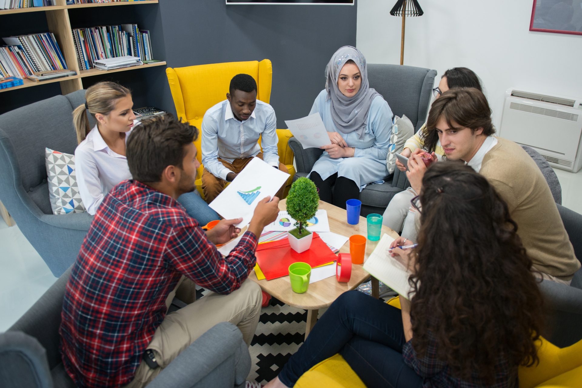 A group of people discussing a training session