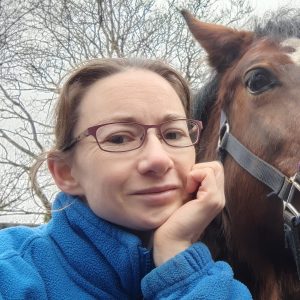 Jenny stood with a horse
